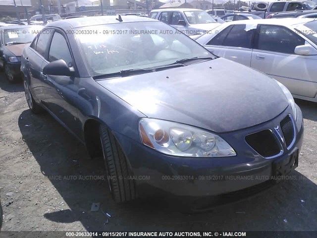 1G2ZG57B294141086 - 2009 PONTIAC G6 SILVER photo 1