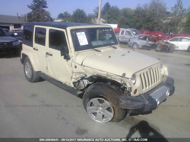 1J4BA5H14BL575892 - 2011 JEEP WRANGLER UNLIMITE SAHARA BEIGE photo 1