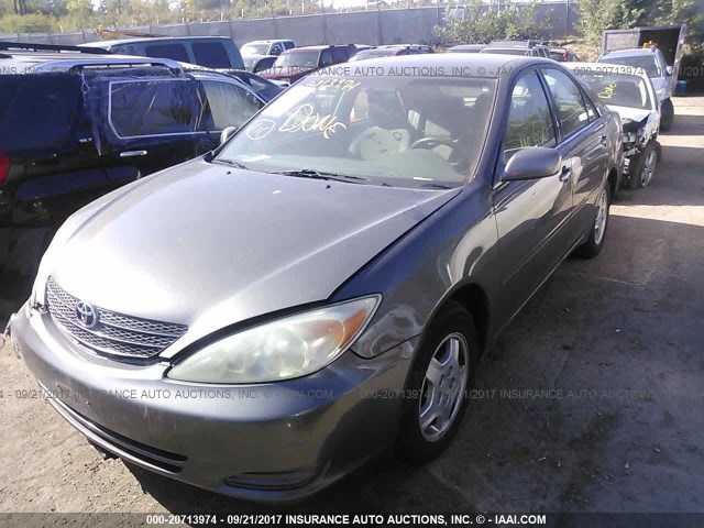 4T1BE32K43U661596 - 2003 TOYOTA CAMRY LE/XLE/SE ნაცრისფერი ფოტო 2