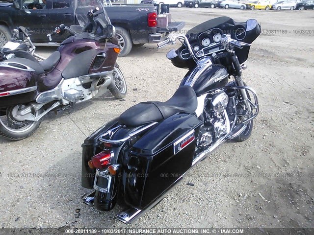 1HD1KB4127Y719659 - 2007 HARLEY-DAVIDSON FLHX BLACK photo 4