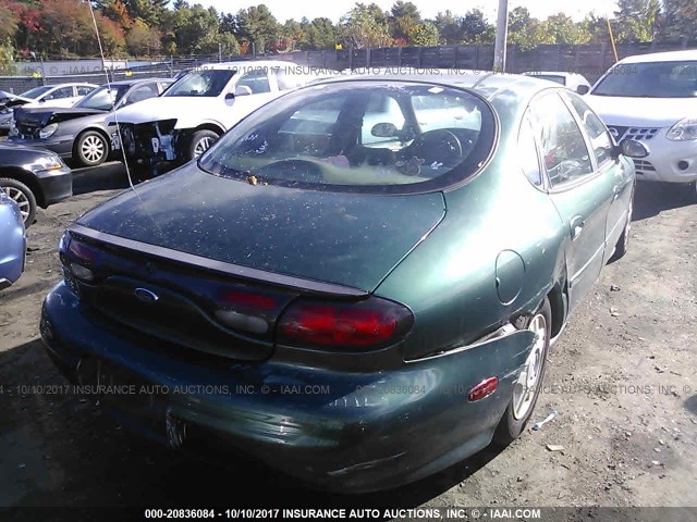 1FAFP52U8XA331440 - 1999 FORD TAURUS LX GREEN photo 4