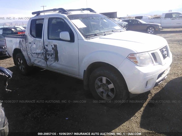 1N6AD07W79C424139 - 2009 NISSAN FRONTIER CREW CAB SE/LE/NISMO WHITE photo 1