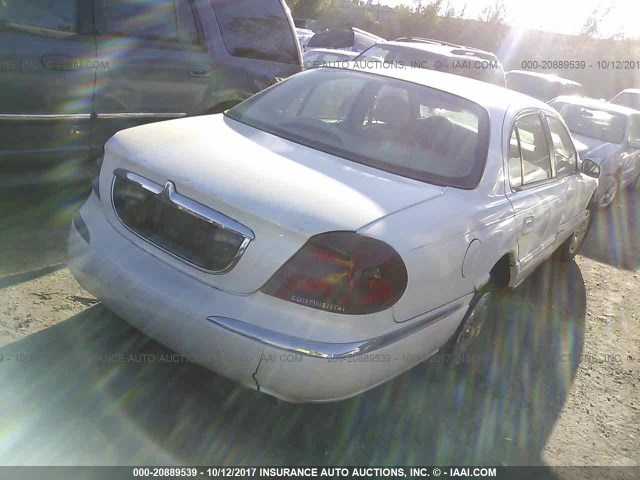 1LNHM97V52Y675503 - 2002 LINCOLN CONTINENTAL  WHITE photo 4