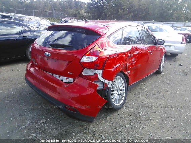 1FAHP3M25CL339311 - 2012 FORD FOCUS SEL RED photo 4