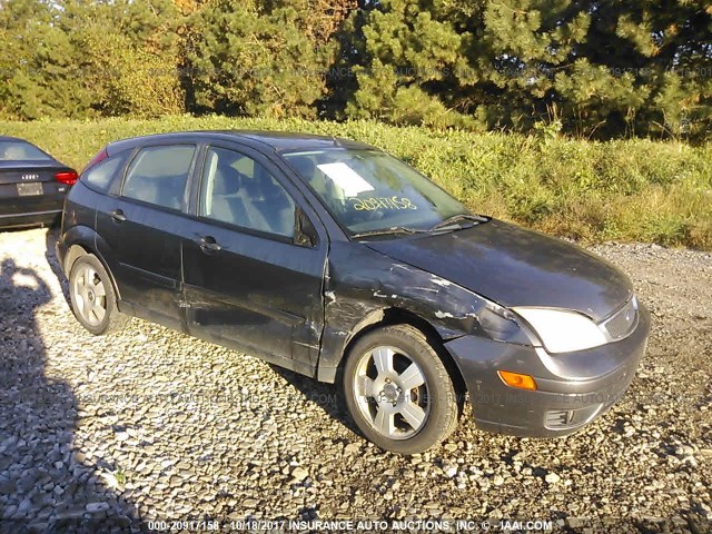 1FAHP37N37W129588 - 2007 FORD FOCUS ZX5/S/SE/SES GRAY photo 1