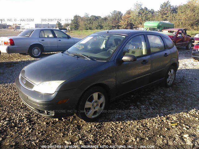 1FAHP37N37W129588 - 2007 FORD FOCUS ZX5/S/SE/SES GRAY photo 2