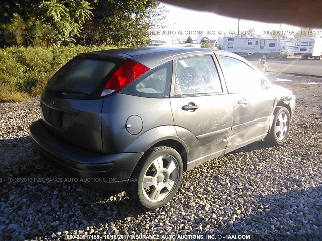 1FAHP37N37W129588 - 2007 FORD FOCUS ZX5/S/SE/SES GRAY photo 4