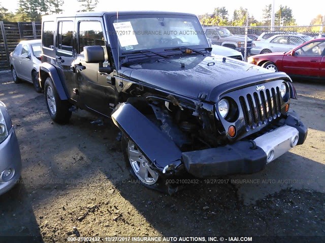 1J4BA5H18BL522418 - 2011 JEEP WRANGLER UNLIMITE SAHARA BLACK photo 1