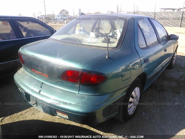 1G2JB5241W7504492 - 1998 PONTIAC SUNFIRE SE GREEN photo 4