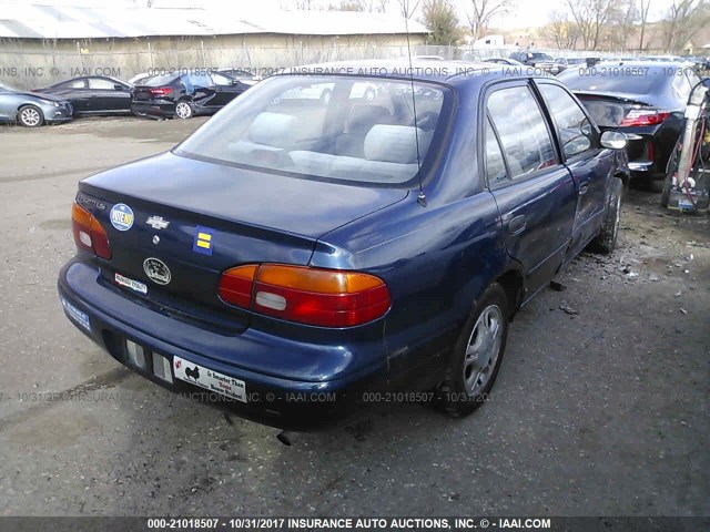 1Y1SK5284WZ443643 - 1998 CHEVROLET GEO PRIZM LSI BLUE photo 4