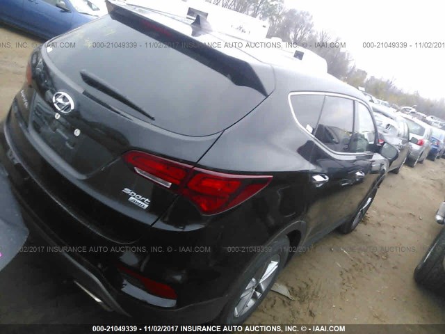 5NMZTDLB9HH044710 - 2017 HYUNDAI SANTA FE SPORT  BLACK photo 4