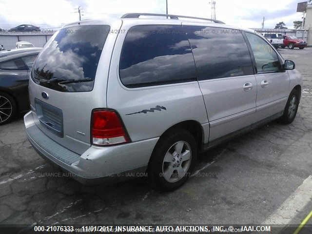 2FMZA57654BB00347 - 2004 FORD FREESTAR SES SILVER photo 4