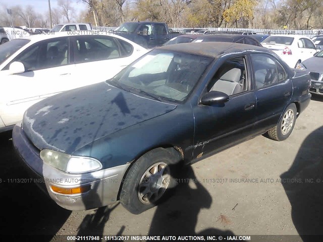 1Y1SK5386PZ074641 - 1993 GEO PRIZM LSI GREEN photo 2