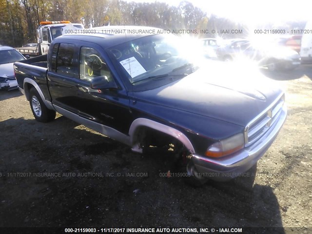 1B7GG2AN81S130582 - 2001 DODGE DAKOTA QUAD BLUE photo 1