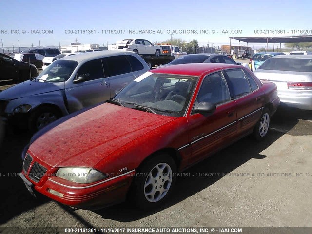 1G2NE55MXSC781292 - 1995 PONTIAC GRAND AM SE RED photo 2