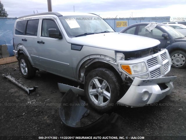 1D4PU5GK1BW544372 - 2011 DODGE NITRO SXT SILVER photo 1