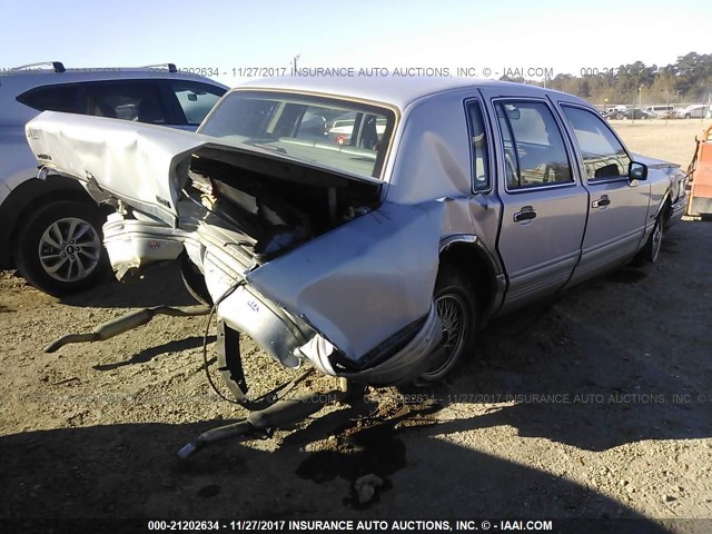 1LNLM81W7RY621250 - 1994 LINCOLN TOWN CAR EXECUTIVE Серебристый фото 4