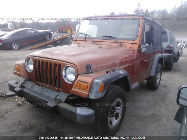 1J4FA49S1YP804887 - 2000 JEEP WRANGLER / TJ SPORT ORANGE photo 2