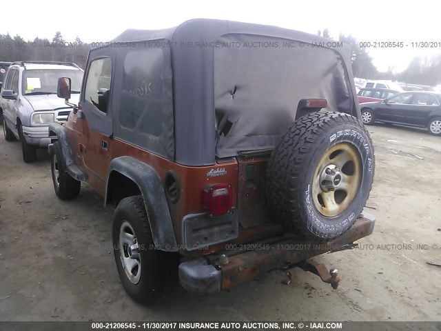 1J4FA49S1YP804887 - 2000 JEEP WRANGLER / TJ SPORT ORANGE photo 3