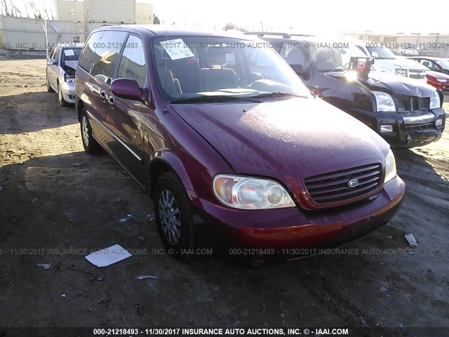 KNDUP131226313767 - 2002 KIA SEDONA EX/LX MAROON photo 1