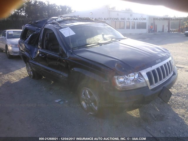 1J8GX58N34C232029 - 2004 JEEP GRAND CHEROKEE LIMITED BLACK photo 1