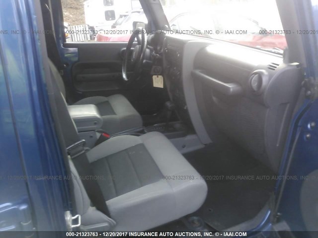 1J4HA3H11AL158470 - 2010 JEEP WRANGLER UNLIMITE SPORT BLUE photo 5