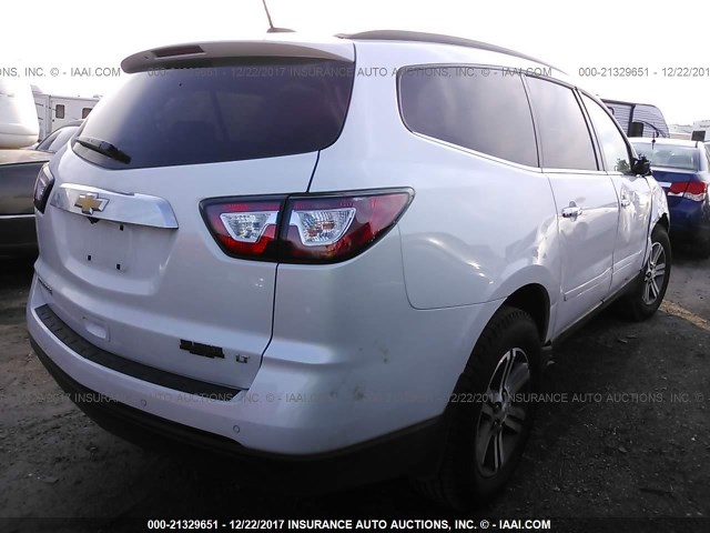 1GNKRHKD8HJ350387 - 2017 CHEVROLET TRAVERSE LT WHITE photo 4