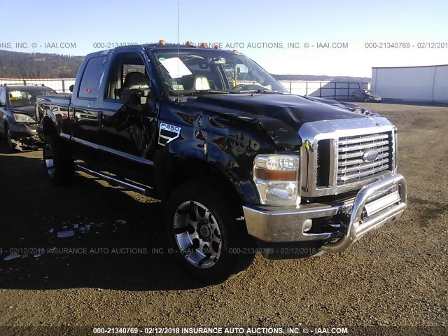 1FTWW3BR4AEA31732 - 2010 FORD F350 SUPER DUTY BLACK photo 1