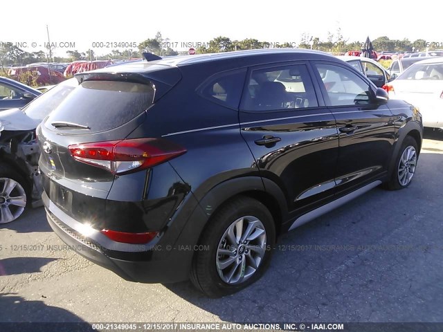 KM8J33A45HU493687 - 2017 HYUNDAI TUCSON LIMITED/SPORT AND ECO/SE BLACK photo 4