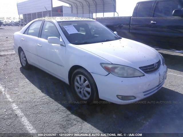 4T1BE30K44U278861 - 2004 TOYOTA CAMRY LE/XLE/SE WHITE photo 1