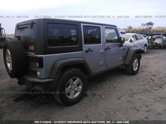 1C4BJWDG8FL556905 - 2015 JEEP WRANGLER UNLIMITE SPORT SILVER photo 4