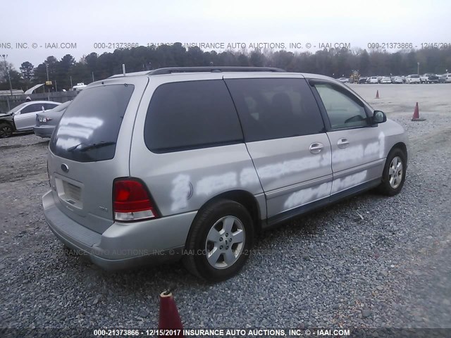 2FMZA57634BA36647 - 2004 FORD FREESTAR SES SILVER photo 4