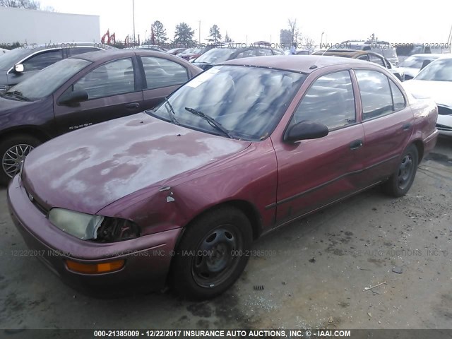 1Y1SK5267VZ439230 - 1997 GEO PRIZM LSI RED photo 2