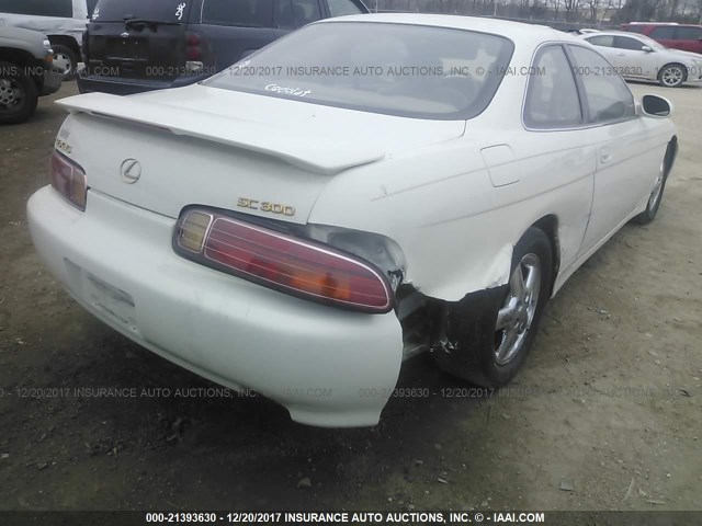 JT8CD32ZXX1004199 - 1999 LEXUS SC 300 WHITE photo 4