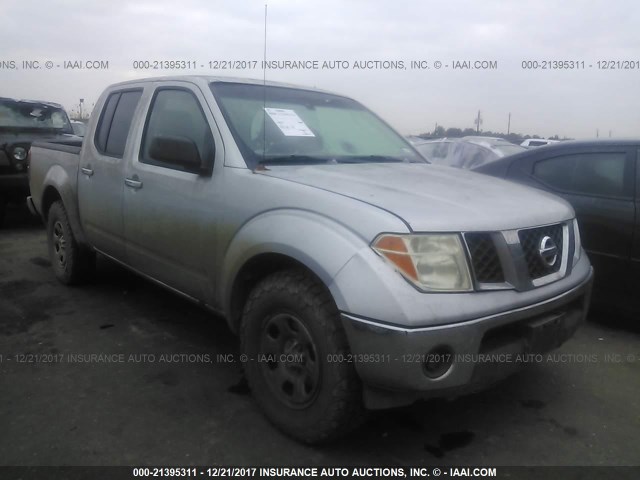 1N6AD07U57C431991 - 2007 NISSAN FRONTIER CREW CAB LE/SE/OFF ROAD SILVER photo 1