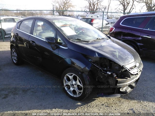 3FADP4FJ1BM106130 - 2011 FORD FIESTA SES BLACK photo 1