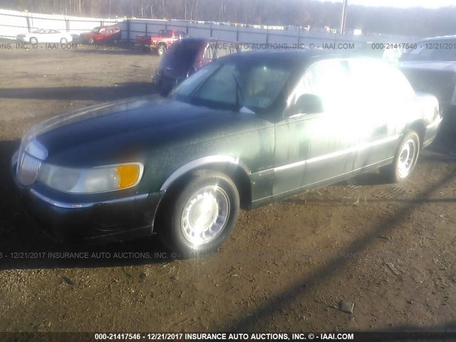 1LNHM81W41Y717654 - 2001 LINCOLN TOWN CAR EXECUTIVE GREEN photo 2