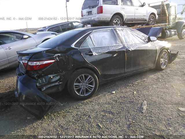 4T1BF1FK7GU131625 - 2016 TOYOTA CAMRY LE/XLE/SE/XSE BLACK photo 4