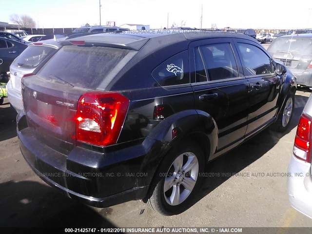 1B3CB3HA9BD107387 - 2011 DODGE CALIBER MAINSTREET BLACK photo 4