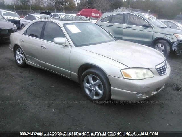 JM1TA221411702667 - 2001 MAZDA MILLENIA TAN photo 1