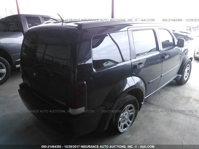 1D4PT2GK9BW500136 - 2011 DODGE NITRO SE BLACK photo 4