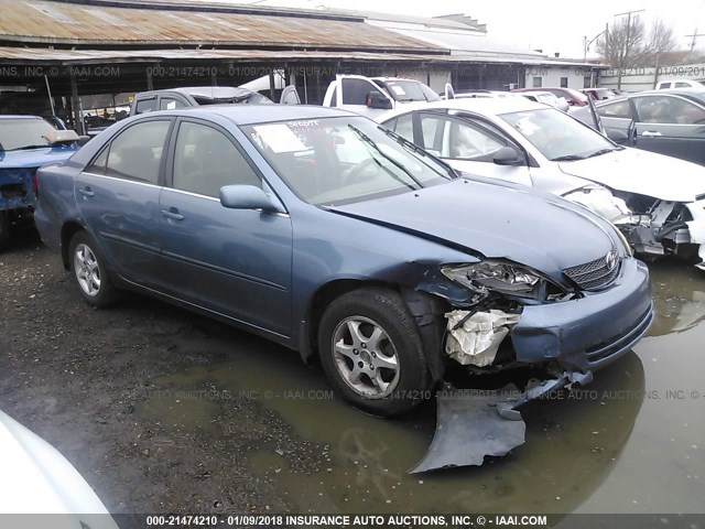 JTDBE32K340262286 - 2004 TOYOTA CAMRY LE/XLE BLUE photo 1