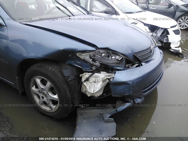 JTDBE32K340262286 - 2004 TOYOTA CAMRY LE/XLE BLUE photo 6