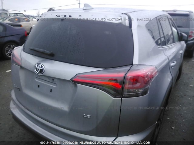 2T3ZFREVXHW403442 - 2017 TOYOTA RAV4 LE SILVER photo 4