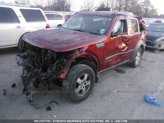 1D8GT28K57W596948 - 2007 DODGE NITRO SXT RED photo 2