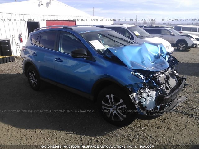 2T3ZFREV4GW273527 - 2016 TOYOTA RAV4 LE BLUE photo 1