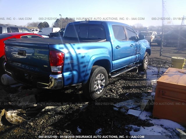 5TFCZ5AN9HX073221 - 2017 TOYOTA TACOMA DBL CAB/SR/TRDSPT/OR/PRO Dark Blue photo 4