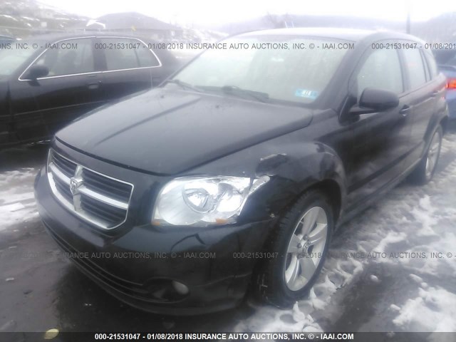 1B3CB3HA0BD120108 - 2011 DODGE CALIBER MAINSTREET BLACK photo 2