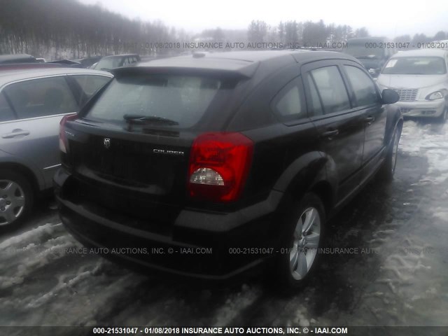 1B3CB3HA0BD120108 - 2011 DODGE CALIBER MAINSTREET BLACK photo 4