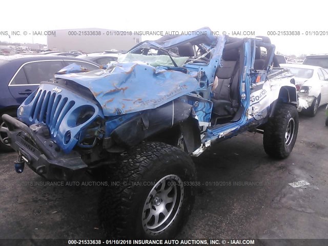 1C4BJWDG9GL156692 - 2016 JEEP WRANGLER UNLIMITE SPORT BLUE photo 2